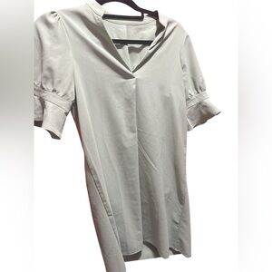 Elegant Cream Dress with V-Neck